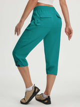 Teal Baleaf lightweight 19'' cargo capri pants with 7 pockets and drawstring ankles. #color_Teal Green