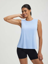 Baleaf UPF 50+ crop open back tank top in light blue on model #color_Light Blue