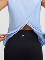 Baleaf UPF 50+ light blue crop tank with open crossed back #color_Light Blue