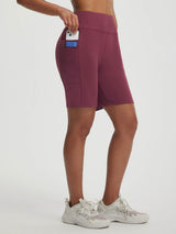 Baleaf women's maroon 7" high-rise running shorts with side and zippered pockets. #color_Dark Red