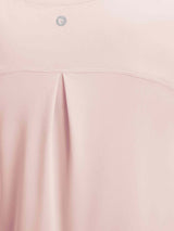 Pink UPF50+ workout tank top back featuring a pleat detail and silver logo. #color_Pink Dogwood
