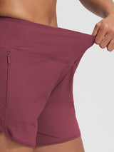 Maroon Baleaf UPF 50+ 7'' high-rise board shorts with secure zipper pocket.