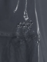Baleaf UPF 50+ board shorts showing water exiting drainage holes. #color_Deep Gray