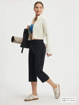 Baleaf 21" black high-rise stretchy capri pants on model #color_Black