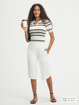 Baleaf white stretchy high-rise 17" capris with side pockets. #color_White
