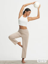 Baleaf 25" Ultra-Soft High-Rise Wide Leg Pants in beige, yoga pose #color_Khaki