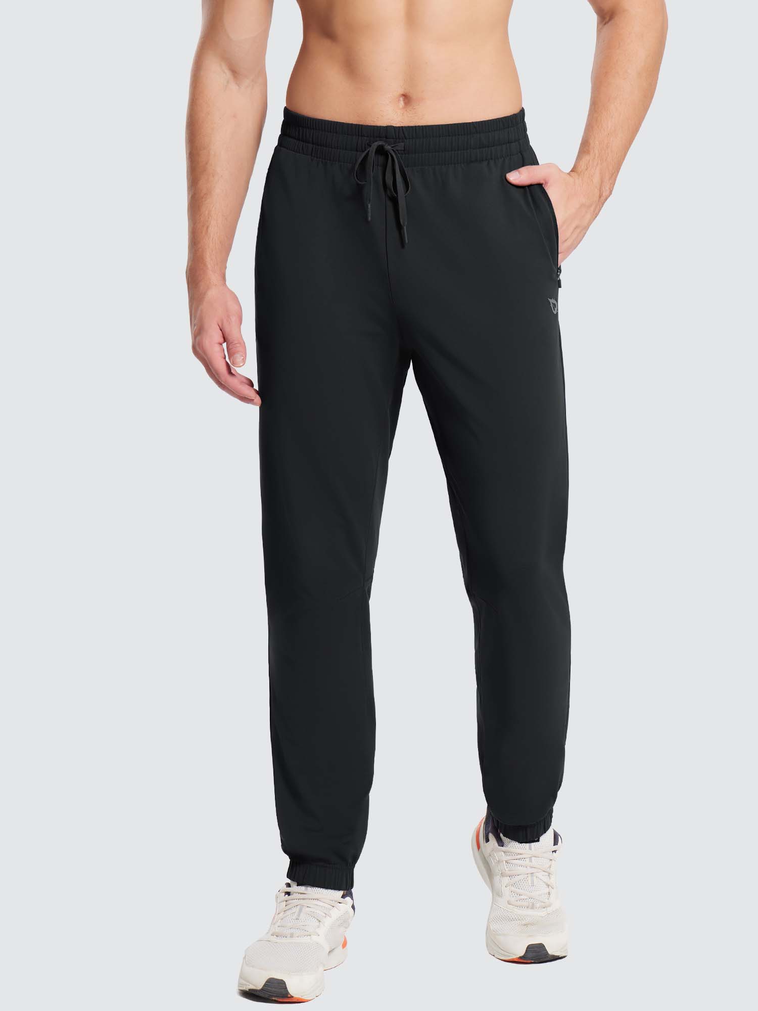 Men's black fleece jogger pants with drawstring, zippered pocket, and reflective accents. #color_Black