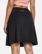 Black Baleaf UPF50+ pleated skort with a small zippered pocket on the back waistband. #color_Black