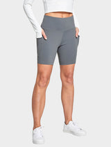 Grey women's 6-inch high-waisted biker shorts with deep side pockets. #color_Cement Gray
