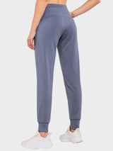 Laureate Thermal Tapered Joggers (Petite) in slate blue, showing tapered leg and elastic cuffs. #color_Sea Blue