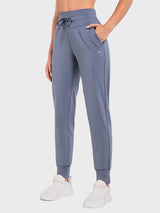 Laureate Thermal Tapered Joggers (Petite) in slate blue, with drawstring and side pockets. #color_Sea Blue