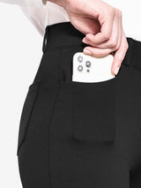Black yoga work flared pants with deep side pockets storing phone #color_Black