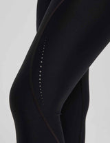 Black women's cycling capris with reflective dots accenting the side seam.