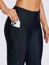 Women's black padded cycling tights with side utility pocket #color_Black