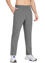 Men's grey tapered running pants with elastic waist and side pockets. #color_Gray