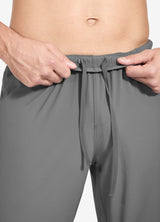 Men's grey running pants detail: elastic waist with adjustable drawstring. #color_Gray