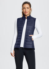 Navy blue slim-fit puffer vest, ideal for cold-weather running and outdoor activities. #color_Navy Blue