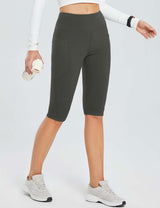 Laureate women's high-waisted dark grey pocketed yoga capris.
