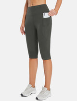 Laureate women's dark grey pocketed yoga capris with phone in side pocket. #color_Dark Gray