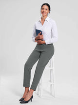 Woman in grey fleece-lined jogger pants and white button-down shirt holding a tablet. #color_Dark Gray