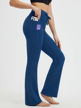Deep blue high-waist flare yoga pants with drawstring and secure pockets for phone and keys. #Color_Navy Blue