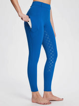 Women's blue fleece equestrian breeches with diamond silicone full seat and phone pockets. #color_Quartz Blue