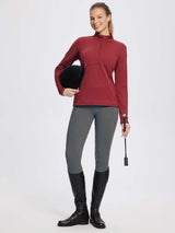 Women's grey fleece equestrian breeches with full seat silicone grip & maroon thermal top.