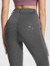 Women's grey fleece equestrian breeches with full seat silicone grip and side zip pocket. #color_Gray