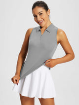 Light grey women's sleeveless golf polo shirt with 1/4 zipper collar. #color_Light Gray