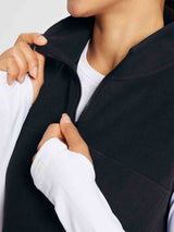 Black sleeveless fleece thermal dress with quarter-zip and high neck #color_Black