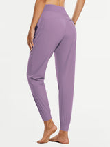 Women's tall lavender quick-dry hiking joggers, high-waisted with pockets. #color_Purple