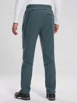 Men's dark teal fleece mountain pants, elastic waist, back view, reflective leg accent.