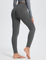 Gray Laureate high-rise thermal leggings with side pockets and contouring lines.
