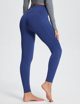 Blue Laureate high-rise thermal leggings with pockets and contouring seams.