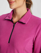 Vibrant pink fleece thermal tunic dress with black quarter zip detail and collar. Comfortable, flattering fit.