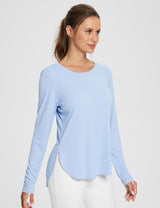 Woman wearing a light blue UPF 50+ long sleeve shirt with side slits and thumb holes. #color_Kentucky Blue