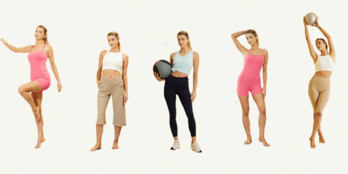 Five women in colorful activewear posing with exercise balls