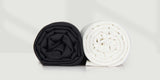 Rolled black and white wrinkle-free fabric