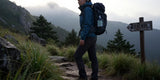 womens outdoor clothing on mountain trail with cinematic morning light