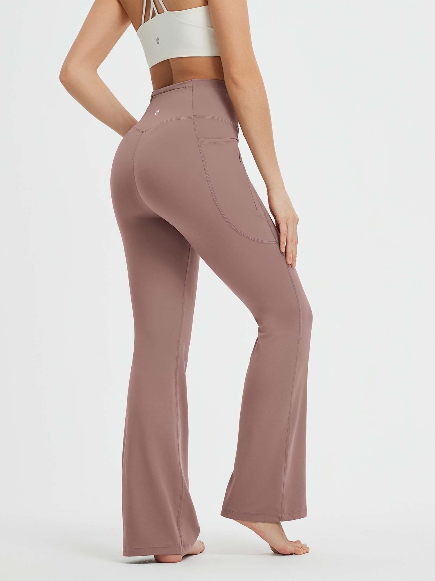 Mauve high-waist flare yoga pants with side pockets and drawstring, for all-season comfort. #Color_Brown