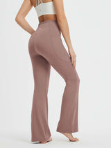 Mauve high-waist flare yoga pants with side pockets and drawstring, for all-season comfort. #Color_Brown