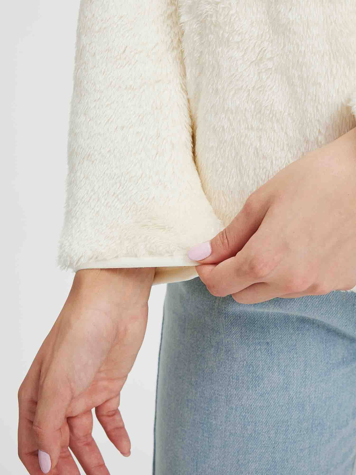 Women's cream arctic fleece pullover, showcasing soft fabric texture. #Color_White