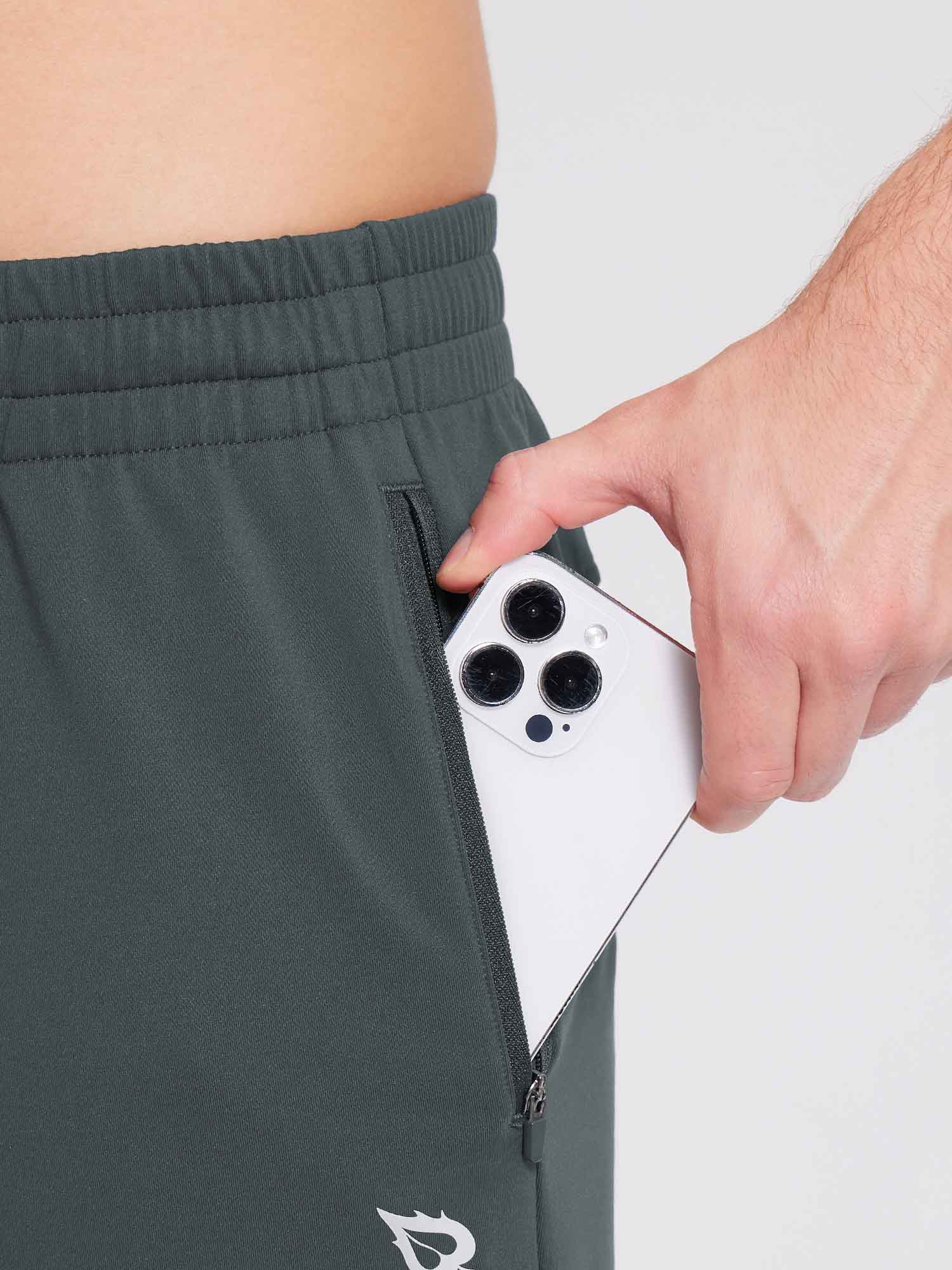 Men's dark grey fleece jogger pants with zippered pocket for phone. #color_Dark Gray