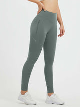 Grey waterproof fleece cycling leggings with side zipper pocket and reflective details #color_Dark Gray