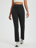 Women's black fleece running pants, boot-cut style, high-waist, straight leg, side pockets. #color_Black