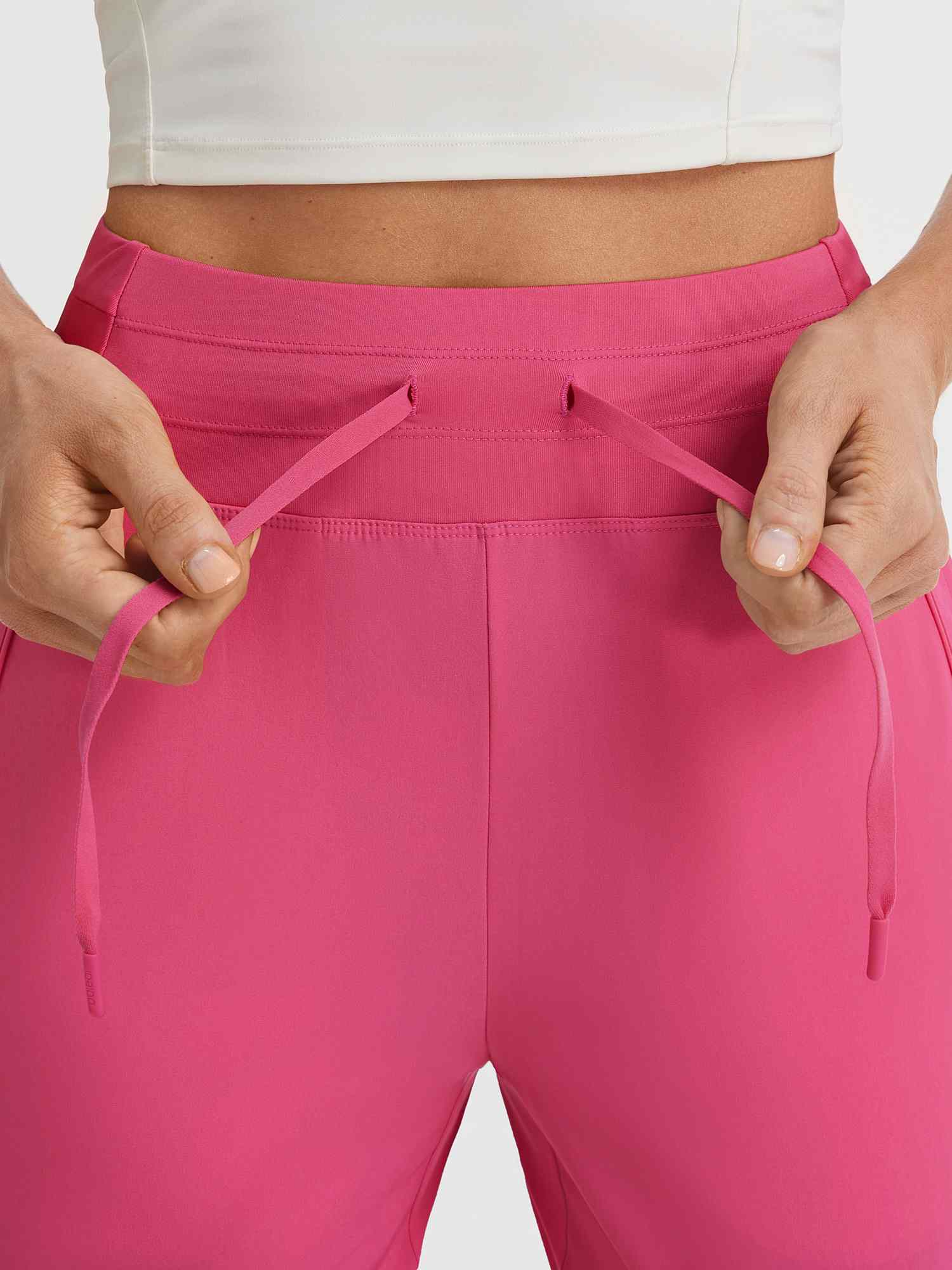 Baleaf pink UPF 50+ high-rise 9" shorts adjustable drawstring waistband #color_Hot Pink