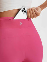 Baleaf high-rise 9" pink workout shorts with phone pocket and drawstring. #color_Hot Pink