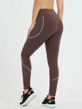 Waterproof fleece seamless cycling leggings in brown with reflective details & zip pockets. #color_Dark Brown