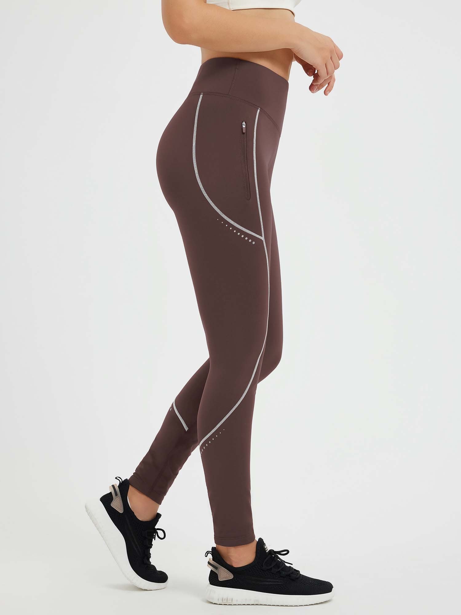 High-waist plum fleece cycling leggings with waterproof finish, reflective trim & zip pocket.
