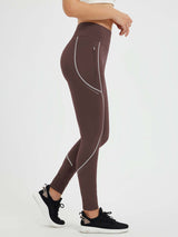High-waist plum fleece cycling leggings with waterproof finish, reflective trim & zip pocket.
